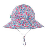 Floral patterned sun hat with a strap on a white background