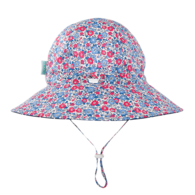 Floral patterned sun hat with a strap on a white background