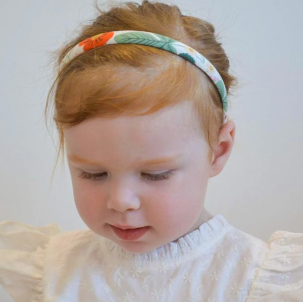 Toddler wearing JOSIE JOAN'S Sybil Alice headband