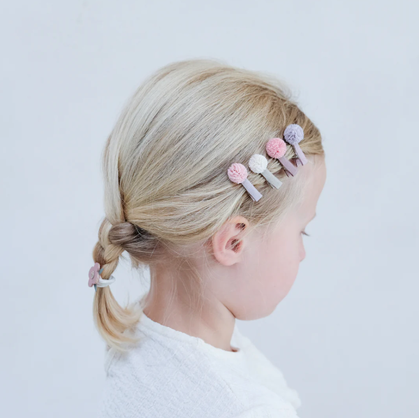 Girl wearing MIMI & LULA Swanlake - Mini Tulle Pom Pom Clips - side view