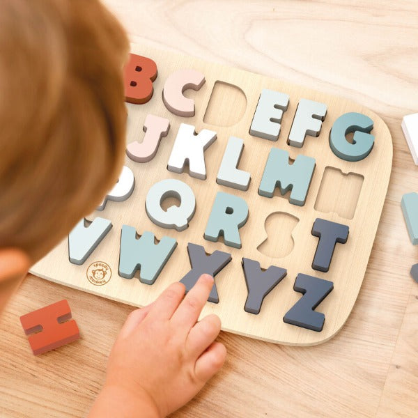 Child playing with SPEEDY MONKEY Alphabet Puzzle