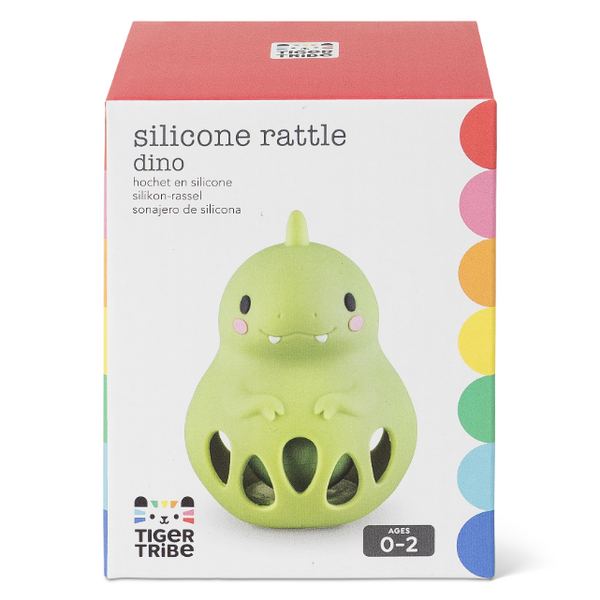 Green dinosaur silicone rattle toy in packaging with Tiger Tribe branding