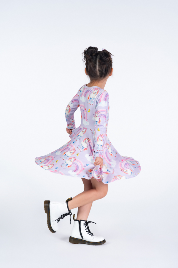 Side view of Girl wearing ROCK YOUR BABY Dreamscapes Waisted Dress