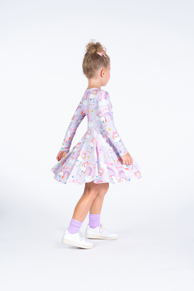 Side view of Girl wearing ROCK YOUR BABY Dreamscapes Waisted Dress
