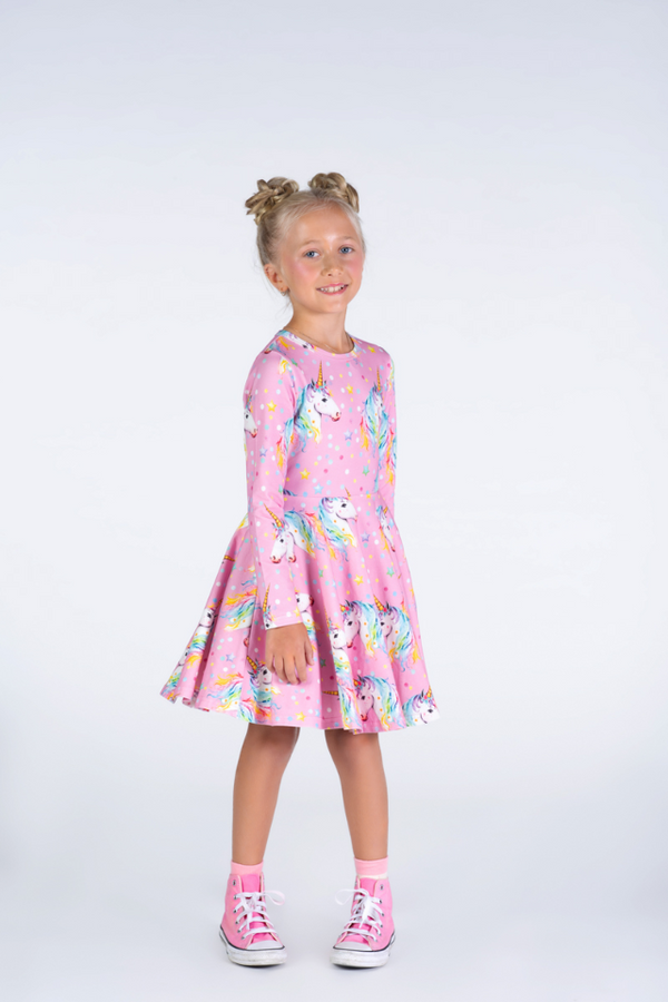 Angle view of child wearing ROCK YOUR BABY Dotty Unicorn Waisted Dress