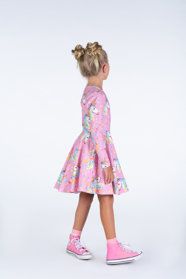 Side view of Angle view of child wearing ROCK YOUR BABY Dotty Unicorn Waisted Dress