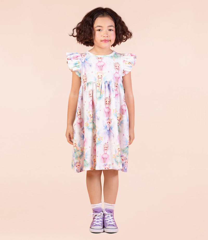 Girl wearing ROCK YOUR BABY Frolic of Fairies Dress - studio shot