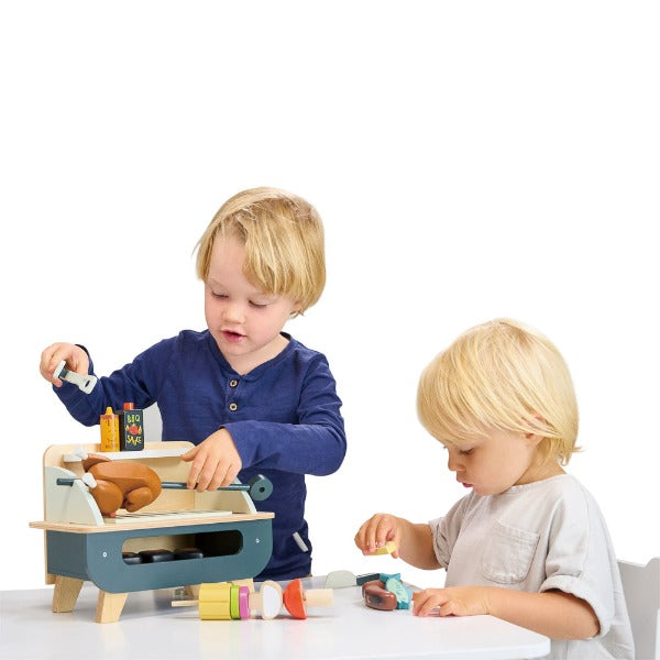 Kids playing with Wooden BBQ play set