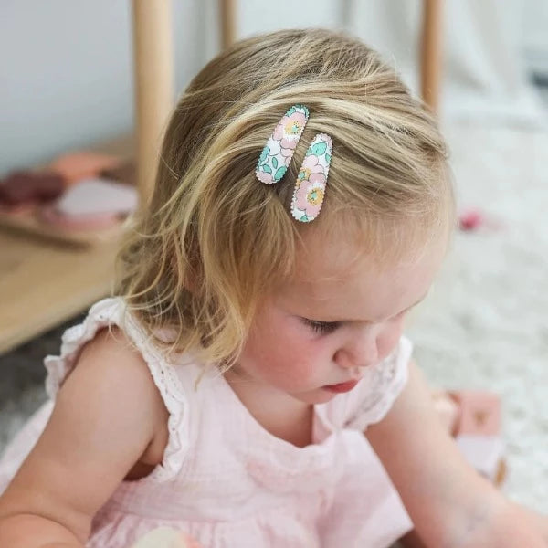 Toddler wearing the JOSIE JOAN'S Little Sage Hair Clips - Limited Edition