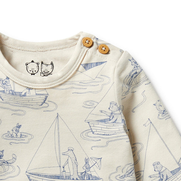 Detail view of shoulder button closure on WILSON + FRENCHY Sail Away Organic Bodysuit