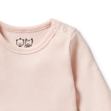 Detail view of neckline WILSON + FRENCHY Pink Organic Bodysuit