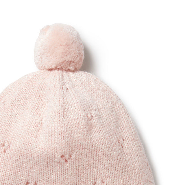 Detail view of pompom WILSON + FRENCHY Pink Knitted Pointelle Bonnet
