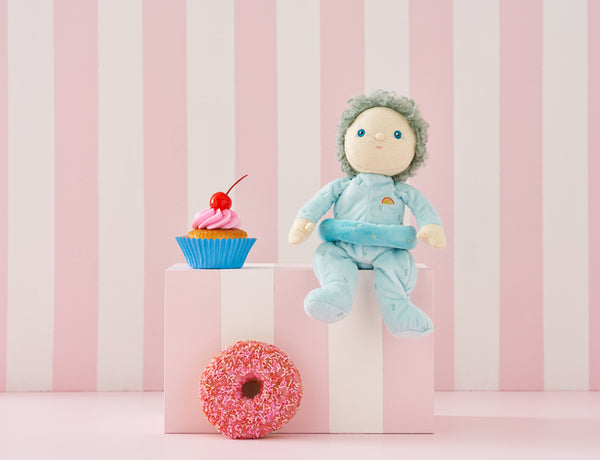 OLLI ELLA Dinky Dinkum Doll Franny Frosting sitting on a box next to a cupcake and donut