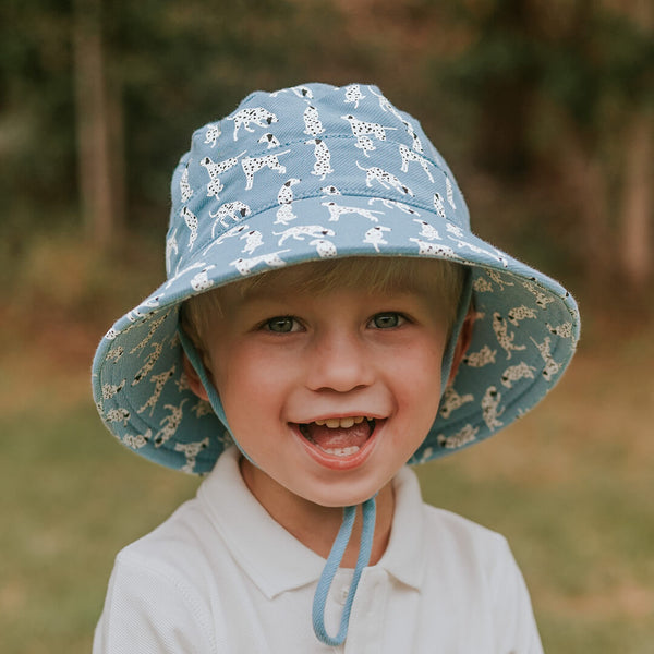 Child wearing BEDHEAD HATS Kids Classic Bucket Sun Hat - Dalmation