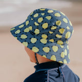 Side view of child wearing BEDHEAD HATS Classic Swim Bucket Hat - Turtle