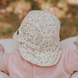 Back view of baby wearing BEDHEAD HATS Legionnaire Flap Sun Hat - Charlotte