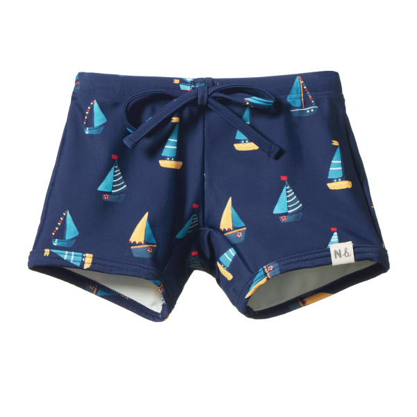 Navy blue shorts with sailboat pattern on a white background
