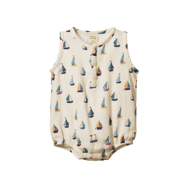 Baby romper with sailboat pattern on a white background