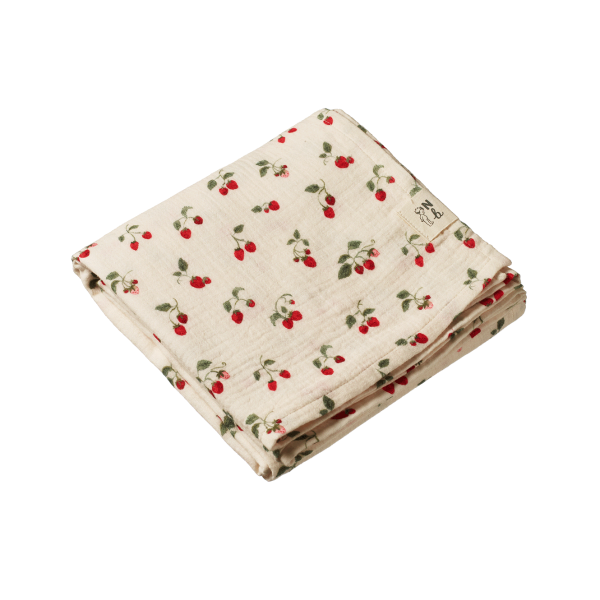 Folded fabric with strawberry pattern on a white background