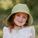 Girl wearing BEDHEAD HATS Ponytail Bucket Sun Hat - Grace