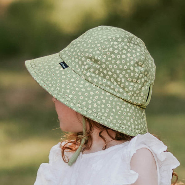 Side view of girl wearing BEDHEAD HATS Ponytail Bucket Sun Hat - Grace