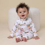 Baby sitting on floor wearing SNUGGLE HUNNY Farm Organic Snugglesuit Convertible Romper