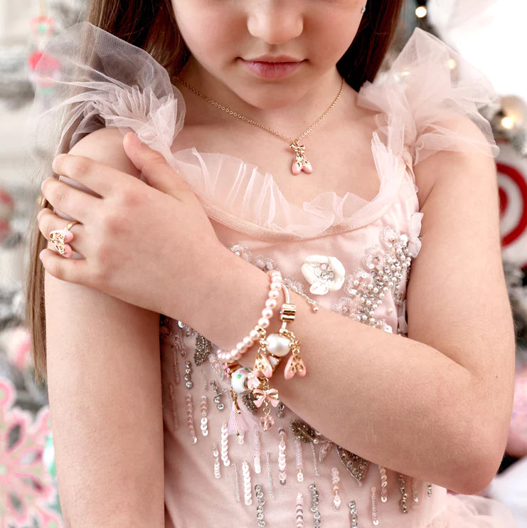 Child wearing the LAUREN HINKLEY Ballet Slippers Necklace