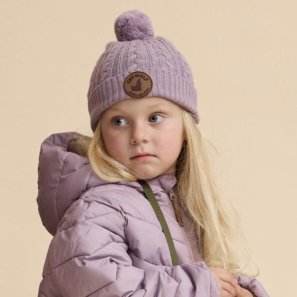 Child wearing the CRYWOLF Pom Pom Beanie - Lilac studio image