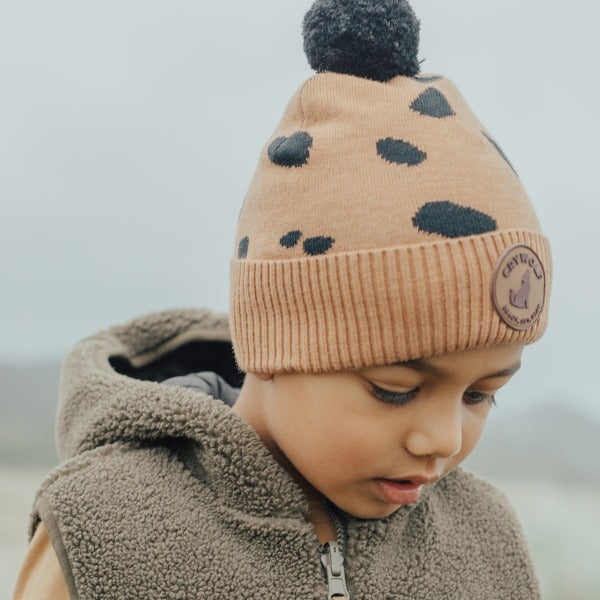 Child wearing the CRYWOLF Pom Pom Beanie - Stones detail view