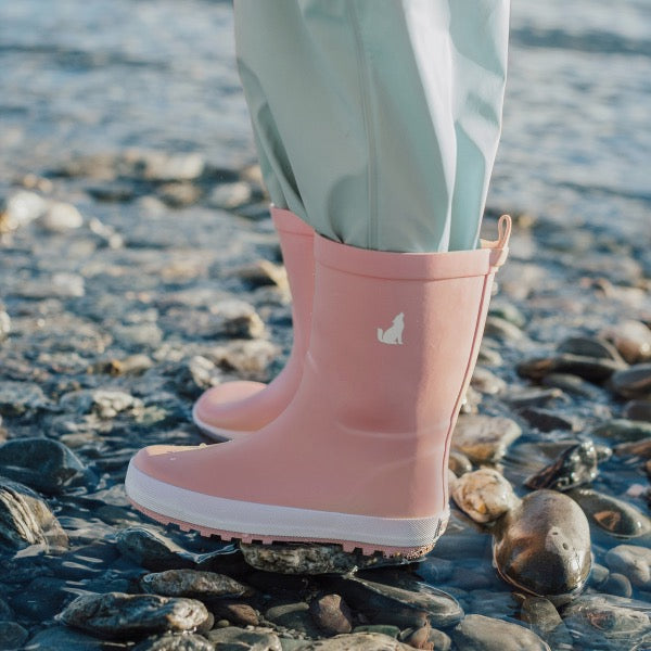 Child wearing the CRYWOLF Rain Boots Blush side view