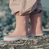 Child wearing the CRYWOLF Rain Boots Blush 