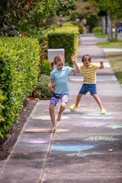 Kids playing with the TIGER TRIBE Chalk It Up - Games For Outdoors
