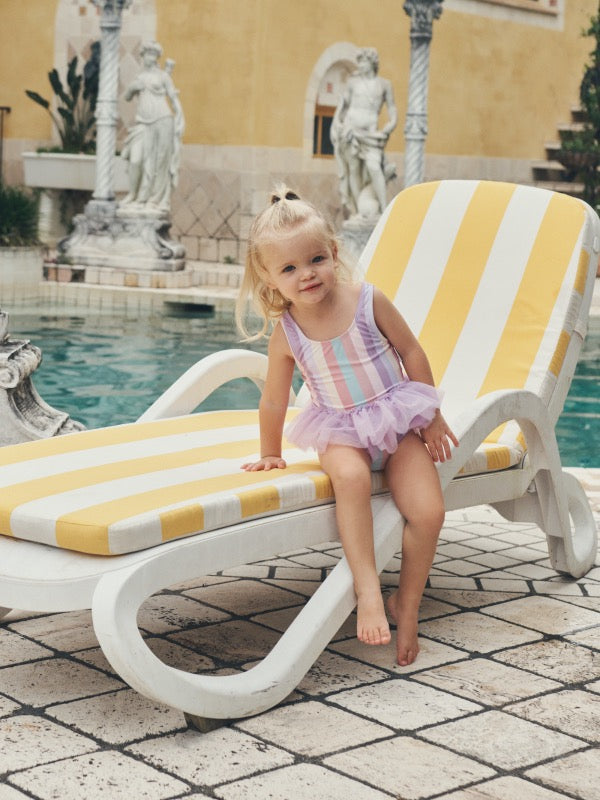 Child wearing the HUXBABY Stripe Ballet Swimsuit