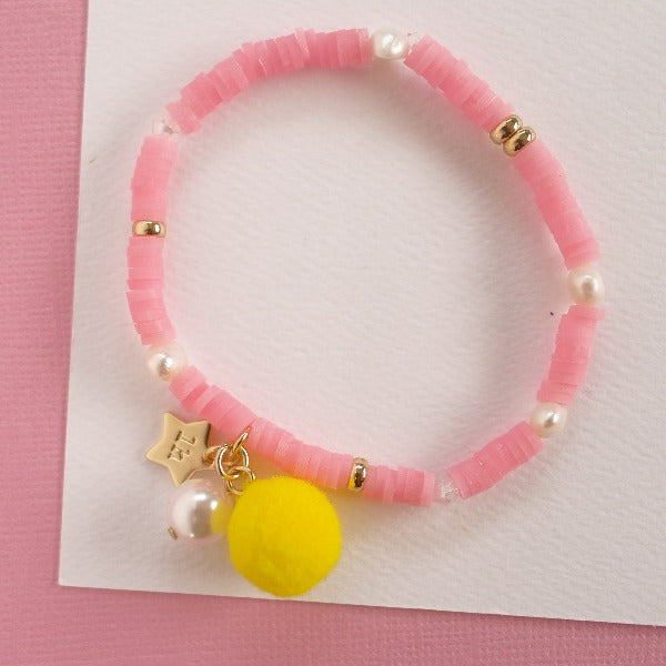 LAUREN HINKLEY Pink Bracelet with Pom Pom and Pearl 