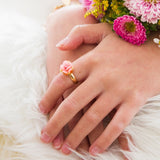 Girl wearing LAUREN HINKLEY Petite Fleur Rose Ring