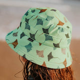 Child wearing the BEDHEAD HATS Kids Classic Swim Bucket Beach Hat - Rays side view