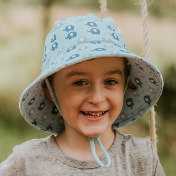 Child wearing the BEDHEAD HATS Kids Classic Bucket Sun Hat - Trunkie