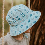 Child wearing the BEDHEAD HATS Kids Classic Bucket Sun Hat - Trunkie side view