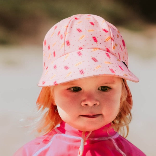 Child wearing the BEDHEAD HATS Kids Swim Legionnaire Beach Hat - Ice Pop 