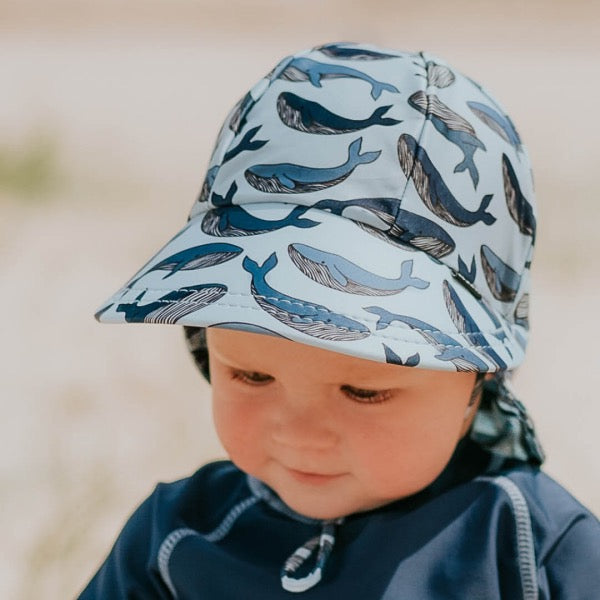 Baby wearing the BEDHEAD HATS Kids Swim Legionnaire Beach Hat - Whale 