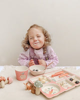 Girl using her LOVE MAE Divided Plate Set - Woodland Friends