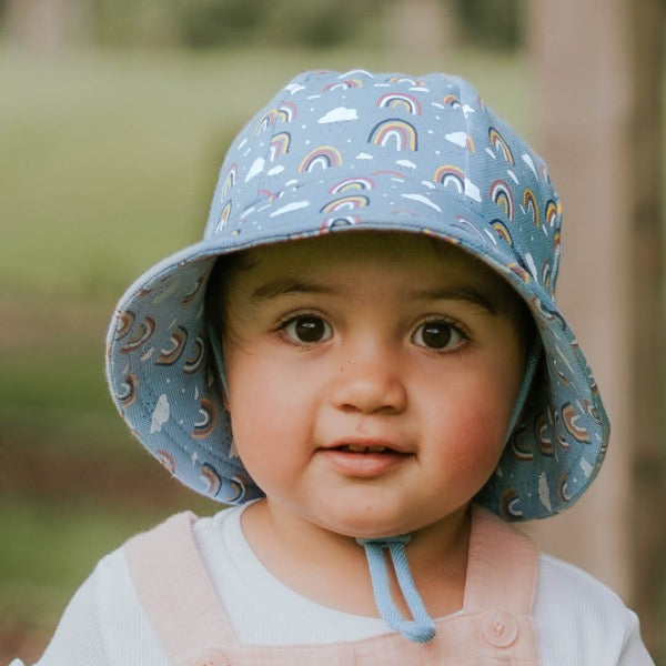 Child wearing the BEDHEAD HATS Toddler Bucket Sun Hat - Rainbow