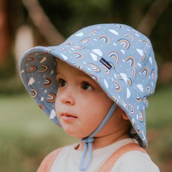 Child wearing the BEDHEAD HATS Toddler Bucket Sun Hat - Rainbow side view