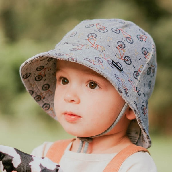 Child wearing the BEDHEAD HATS Toddler Bucket Sun Hat - Treadly 